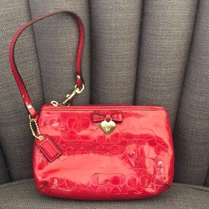 Coach red patent hand bag